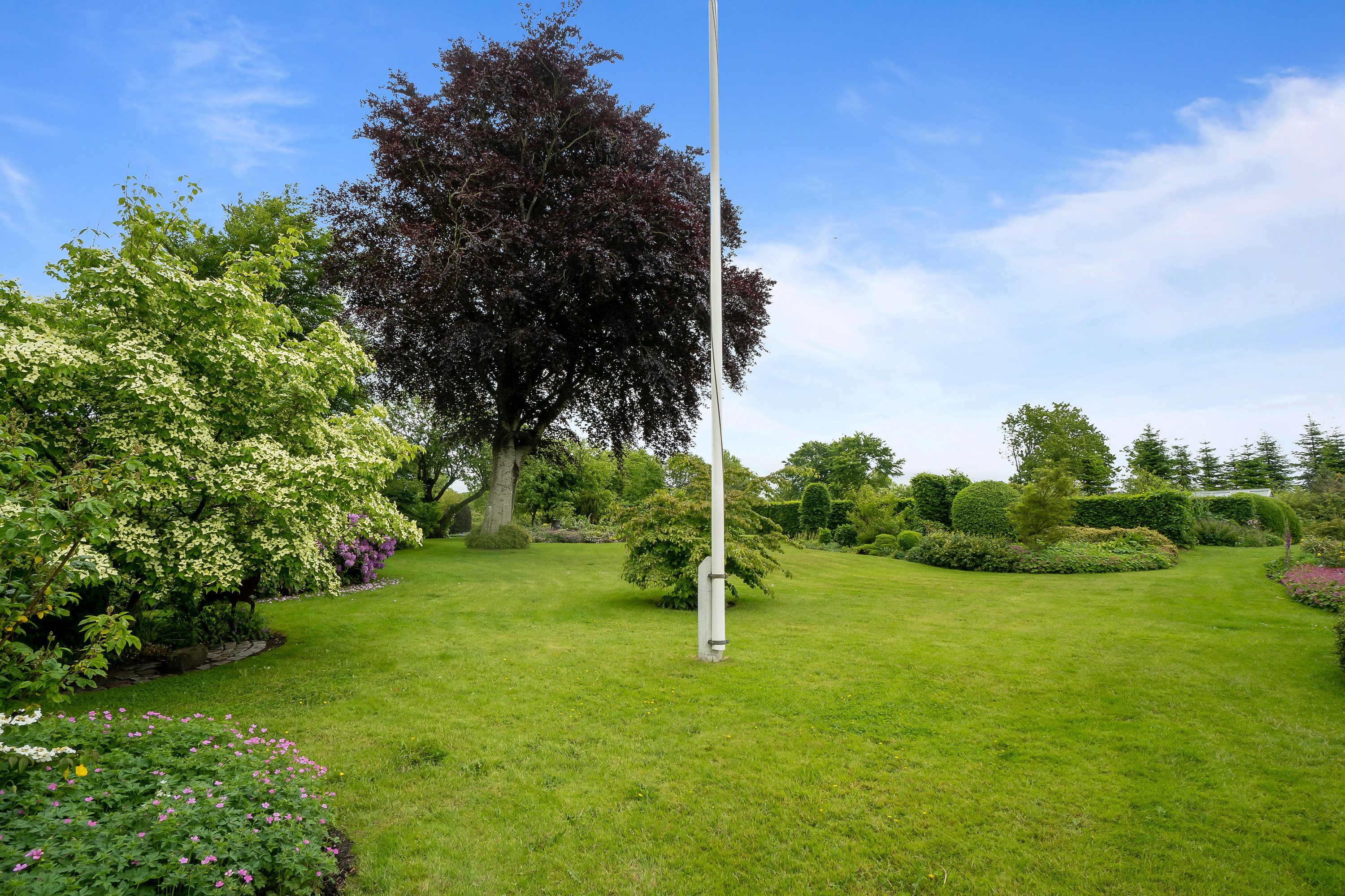 Fremhævet have billede i fuldskærmstilstand. Billede af Mojbølvej 1, Øster Lindet, 6630 Rødding