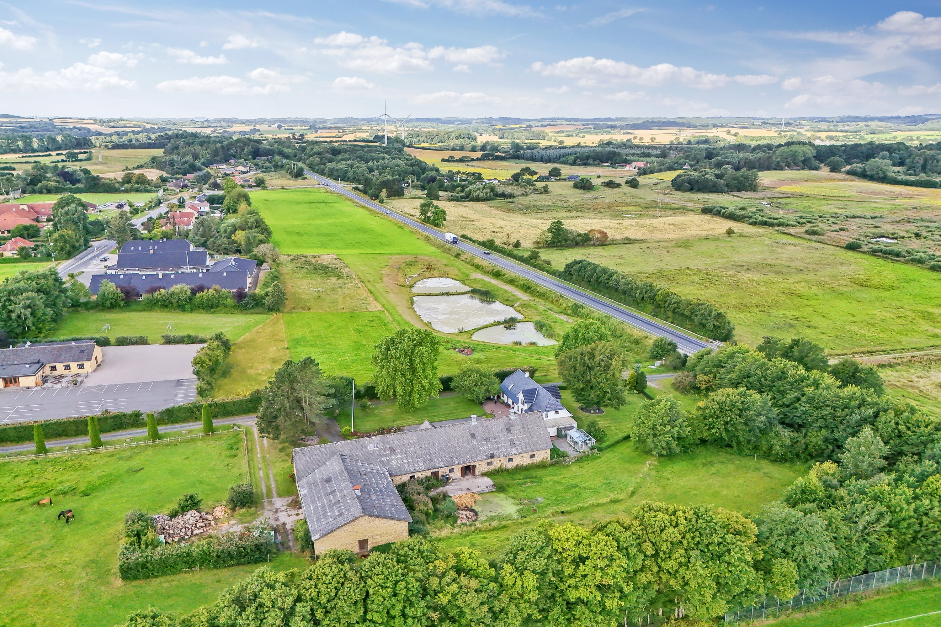 Fremhævet luftfoto billede i fuldskærmstilstand. Billede af Fuglekildevej 83A, Verninge, 5690 Tommerup