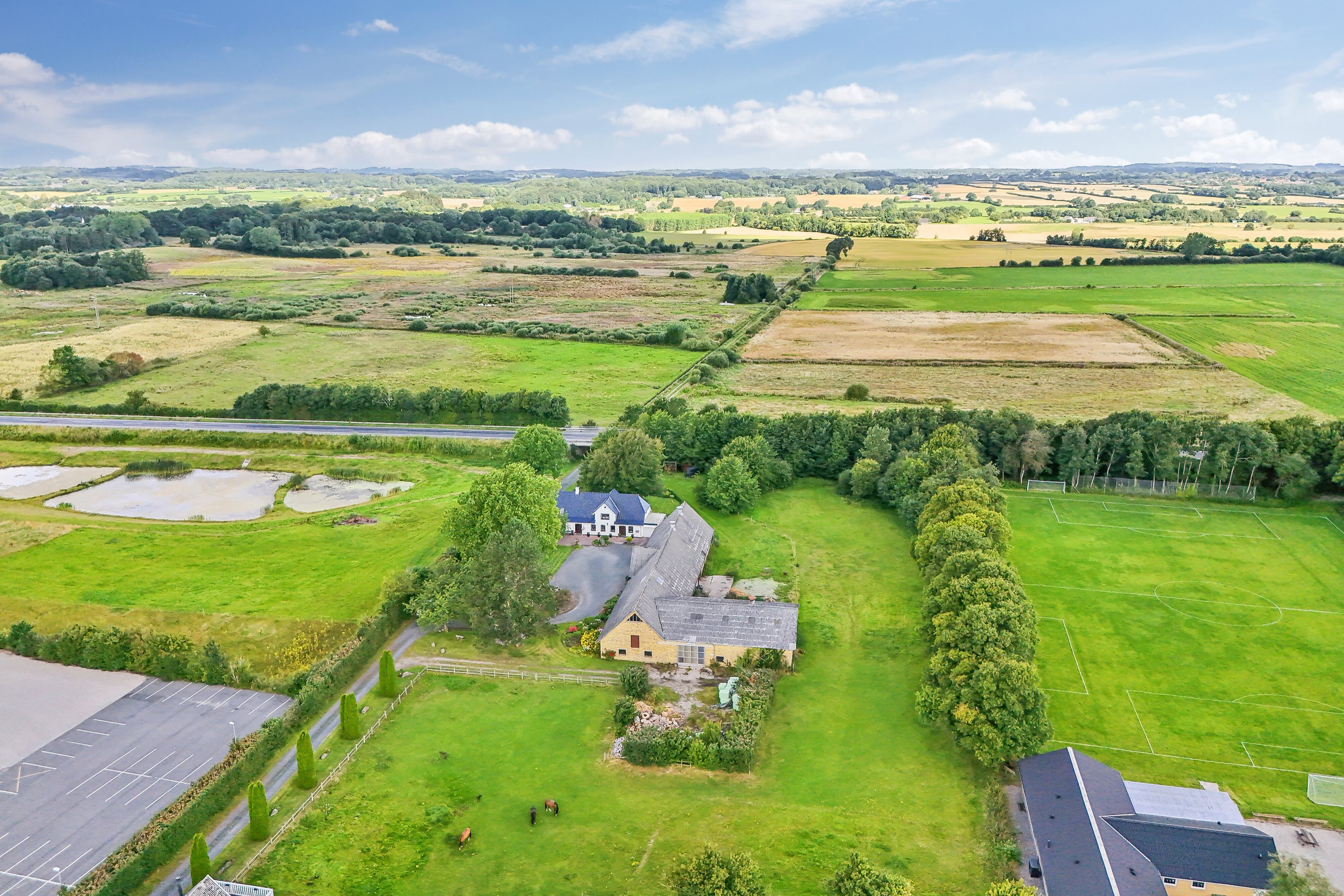 Fremhævet luftfoto billede i fuldskærmstilstand. Billede af Fuglekildevej 83A, Verninge, 5690 Tommerup