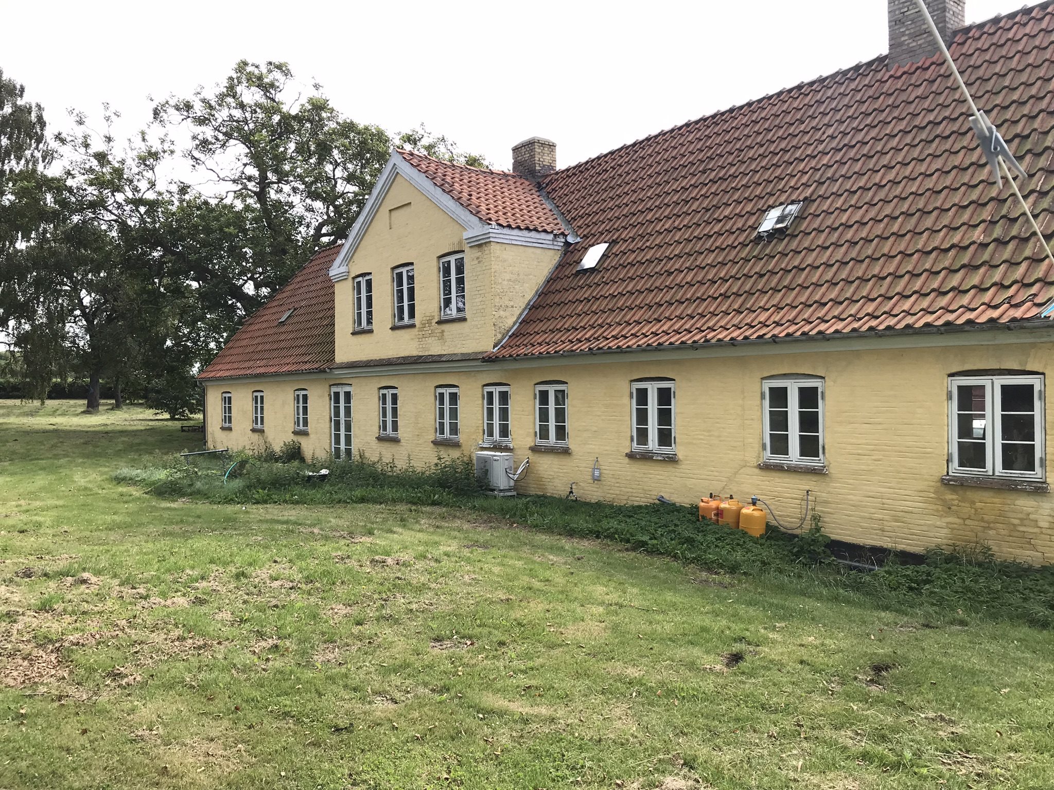 Fremhævet stuehus set fra haven billede i fuldskærmstilstand. Billede af Bjergegyden 12, Sønderby Bj, 5631 Ebberup