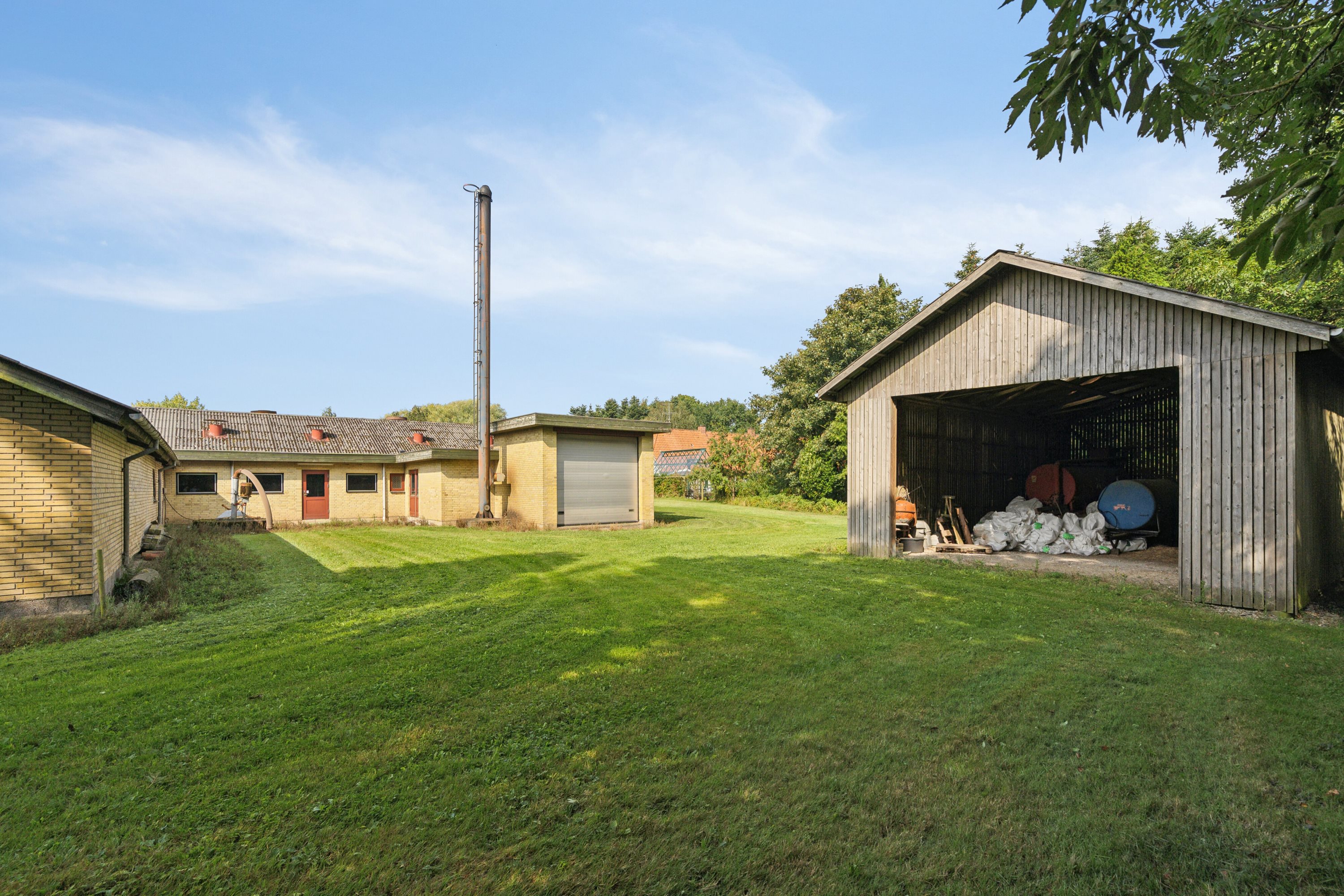 Fremhævet set fra haven billede i fuldskærmstilstand. Billede af Himmelstrupvej 27, Himmelstrup, 5462 Morud