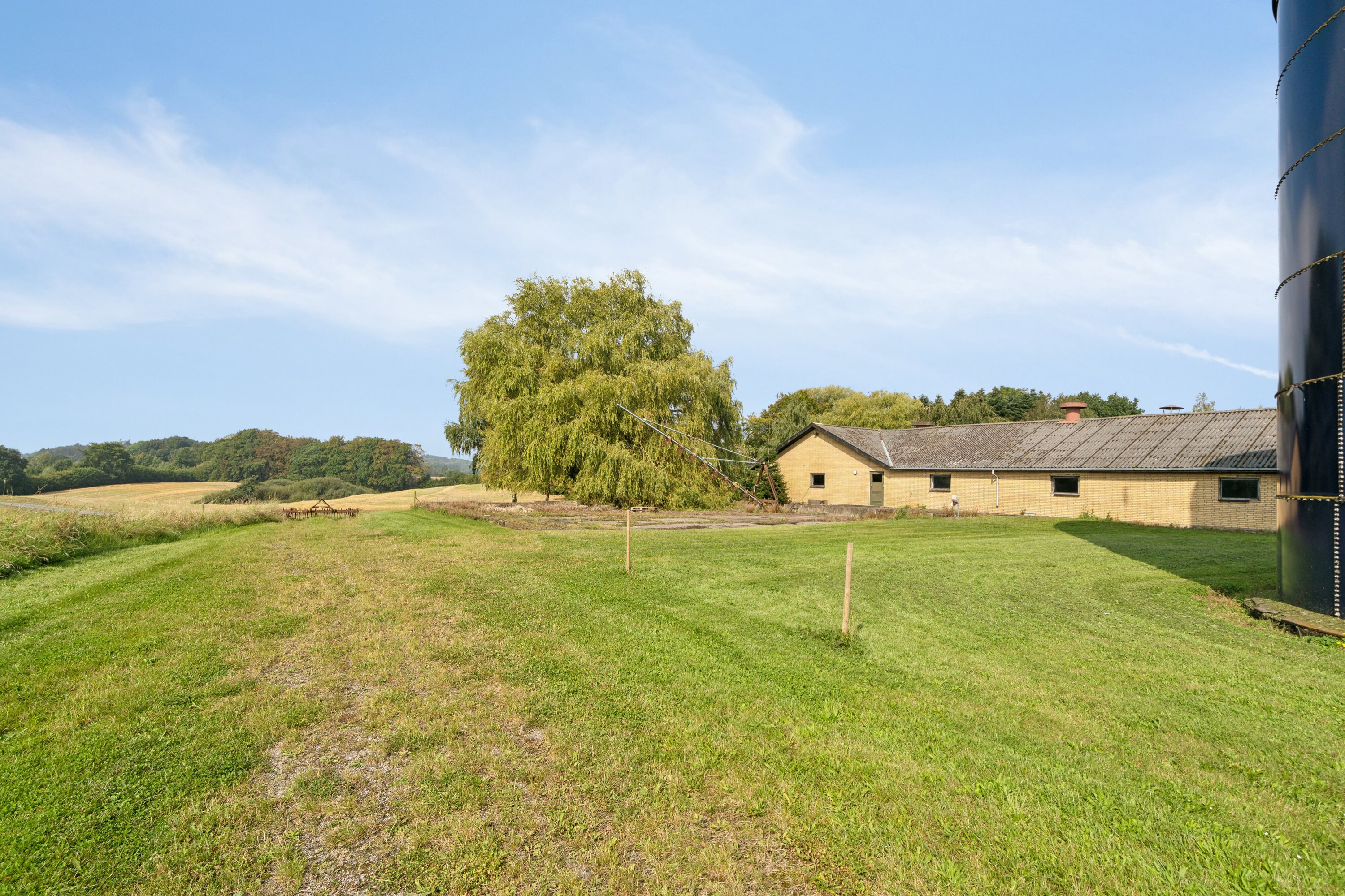 Fremhævet set fra haven billede i fuldskærmstilstand. Billede af Himmelstrupvej 27, Himmelstrup, 5462 Morud