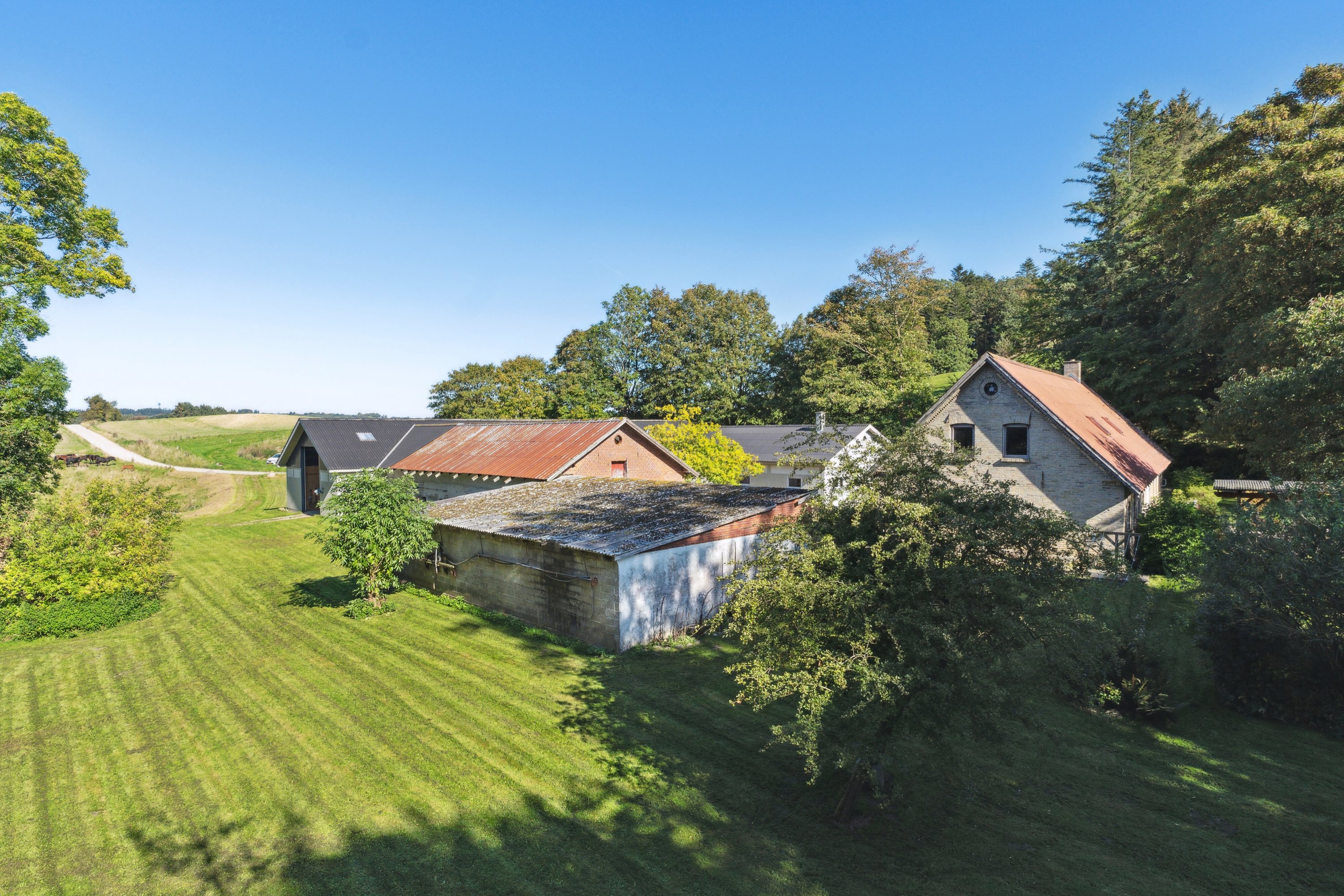 Fremhævet set fra haven billede i fuldskærmstilstand. Billede af Hestvangvej 27, Understed, 9900 Frederikshavn