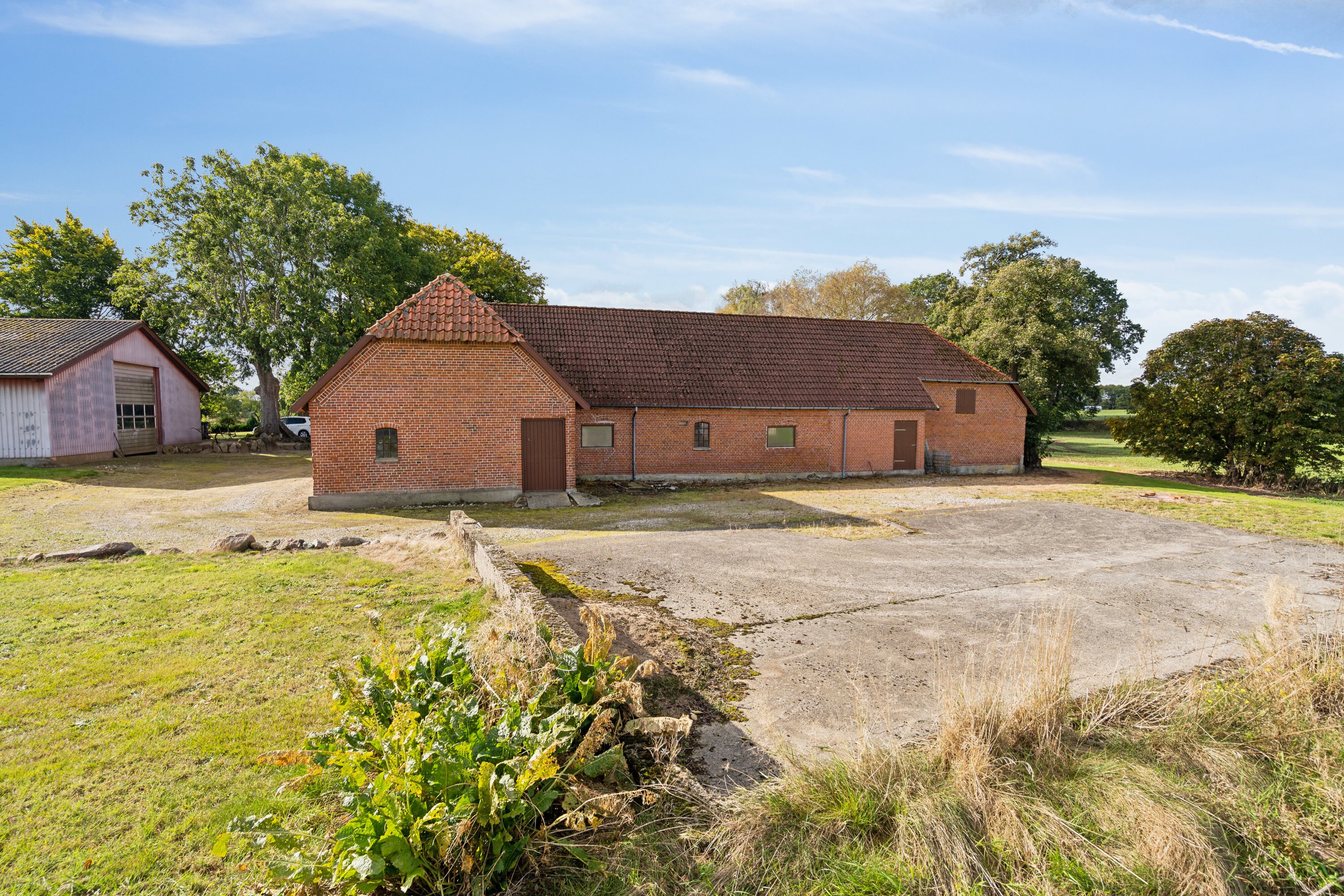 Fremhævet udendørs billede i fuldskærmstilstand. Billede af Rugårdsvej 615, Trøstrup, 5210 Odense NV