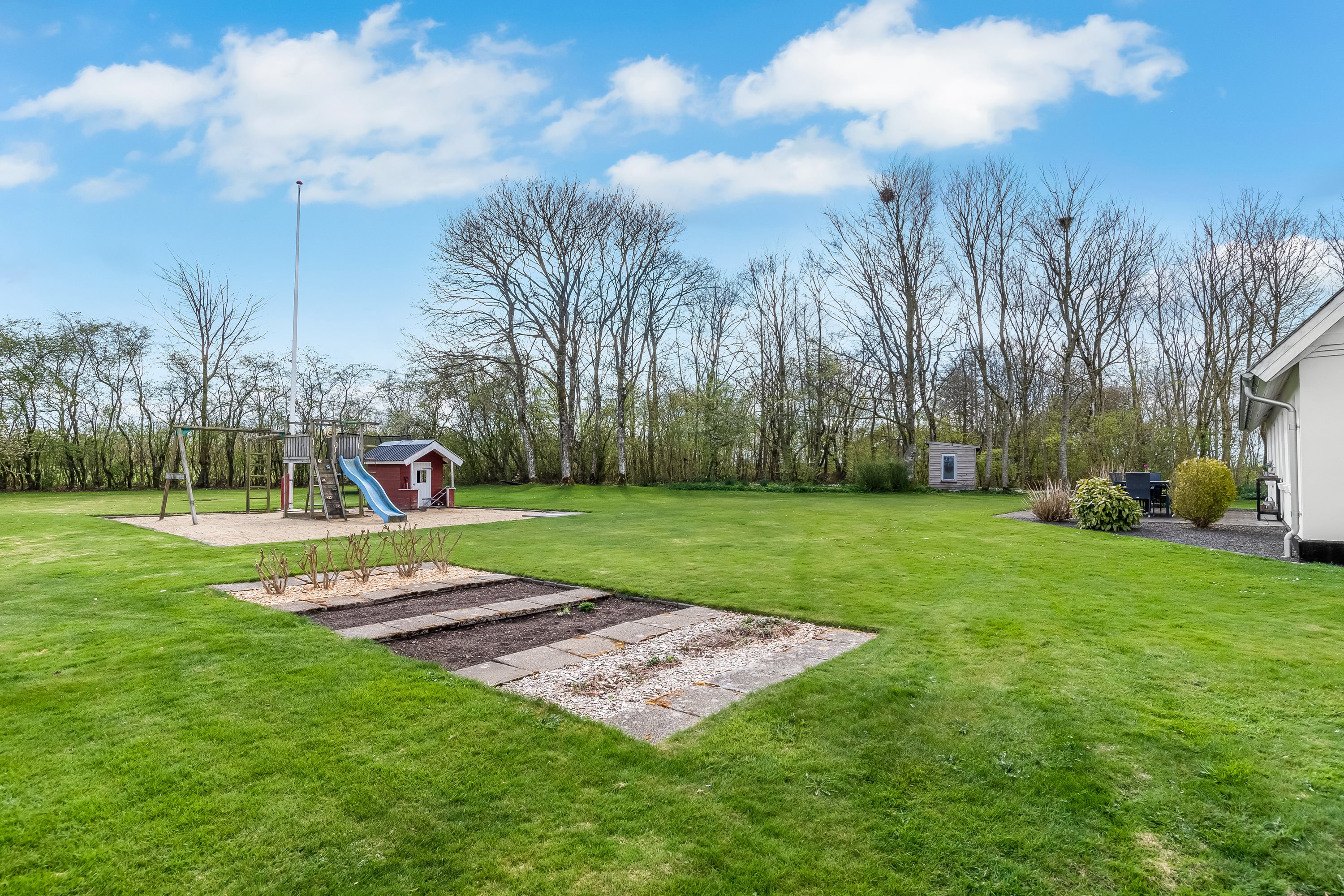 Fremhævet have billede i fuldskærmstilstand. Billede af Røjkærvej 4, Vind, 7500 Holstebro