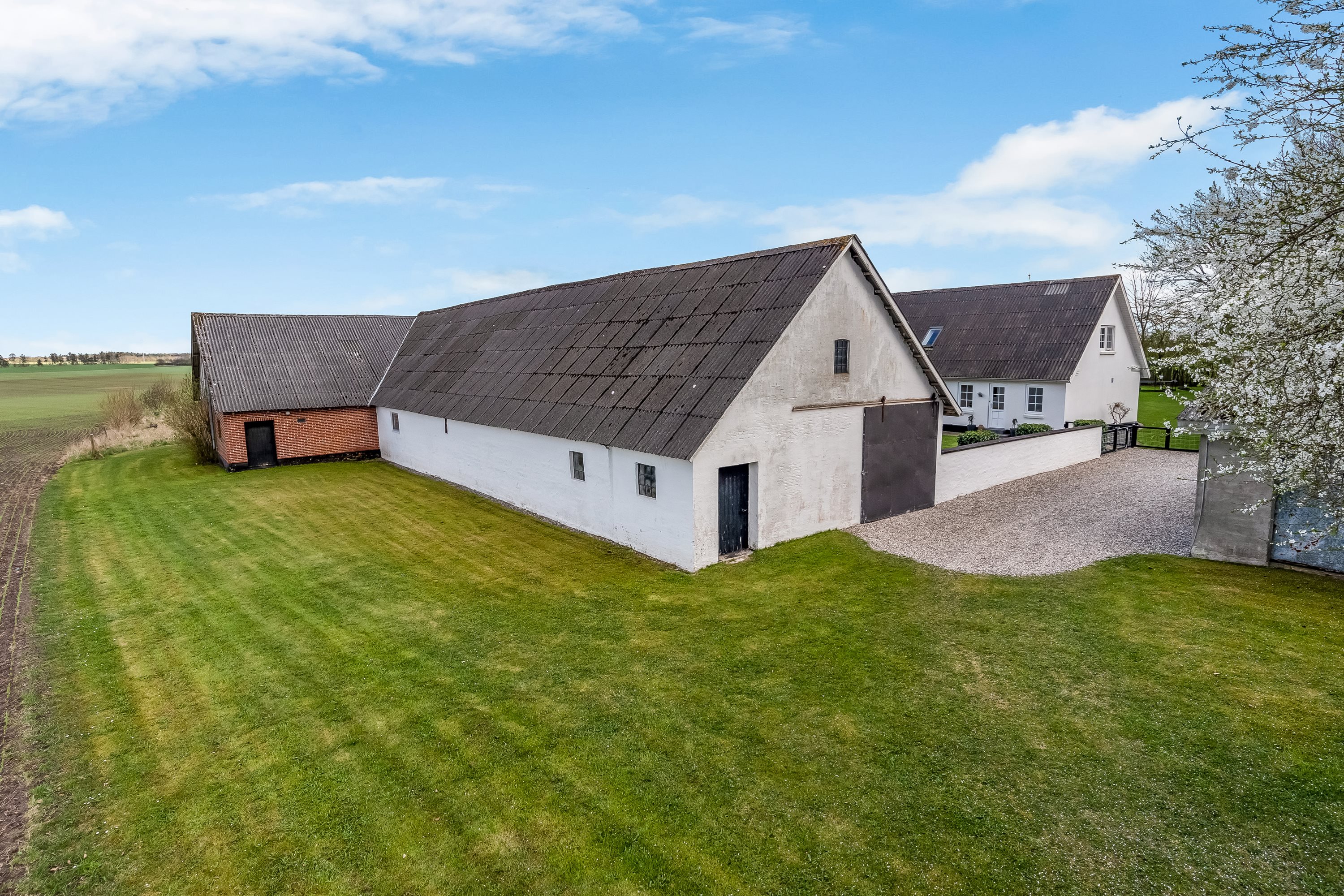 Fremhævet ejendommen billede i fuldskærmstilstand. Billede af Røjkærvej 4, Vind, 7500 Holstebro