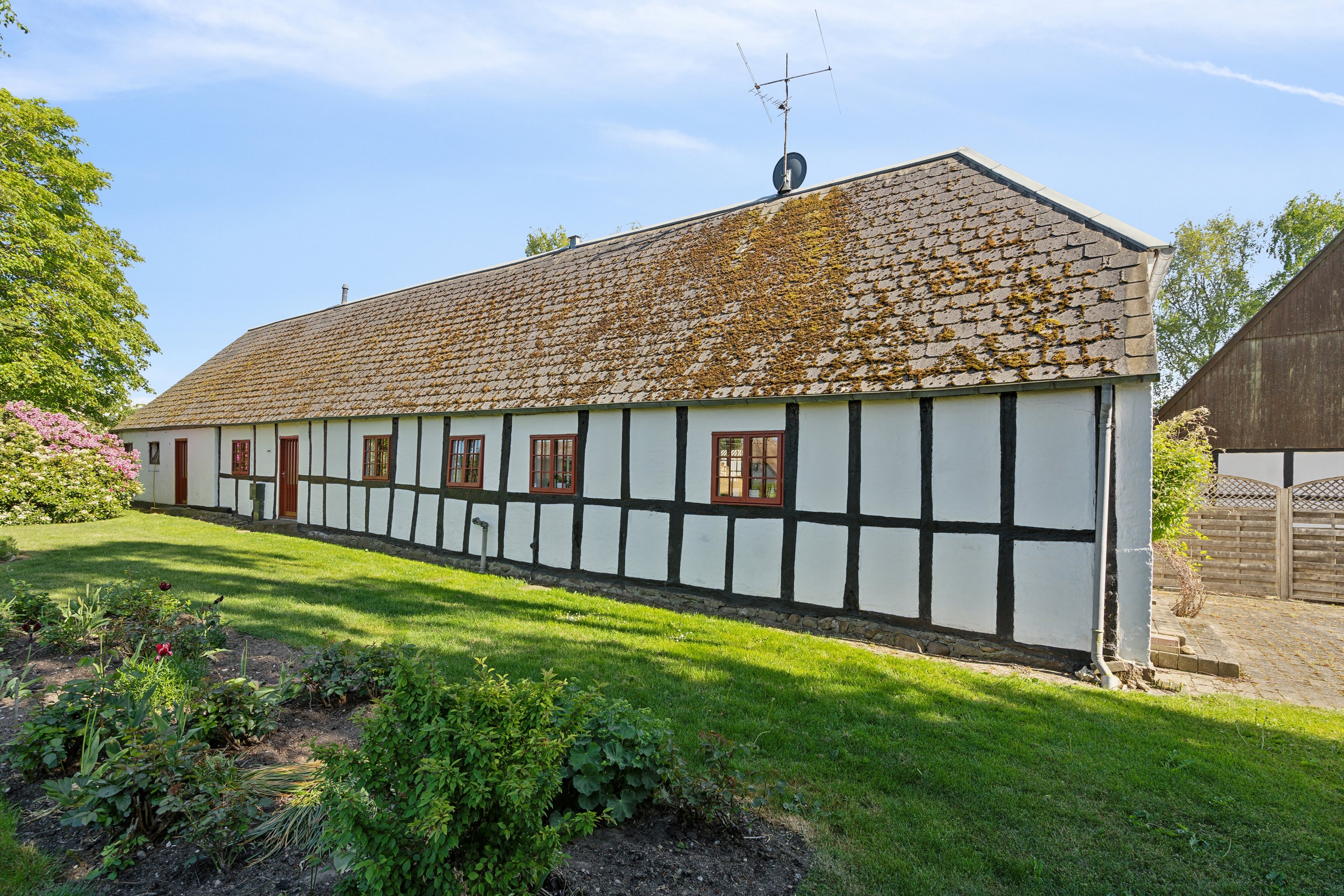 Fremhævet set fra haven billede i fuldskærmstilstand. Billede af Sølvbjergvej 2, Pejrup, 5600 Faaborg