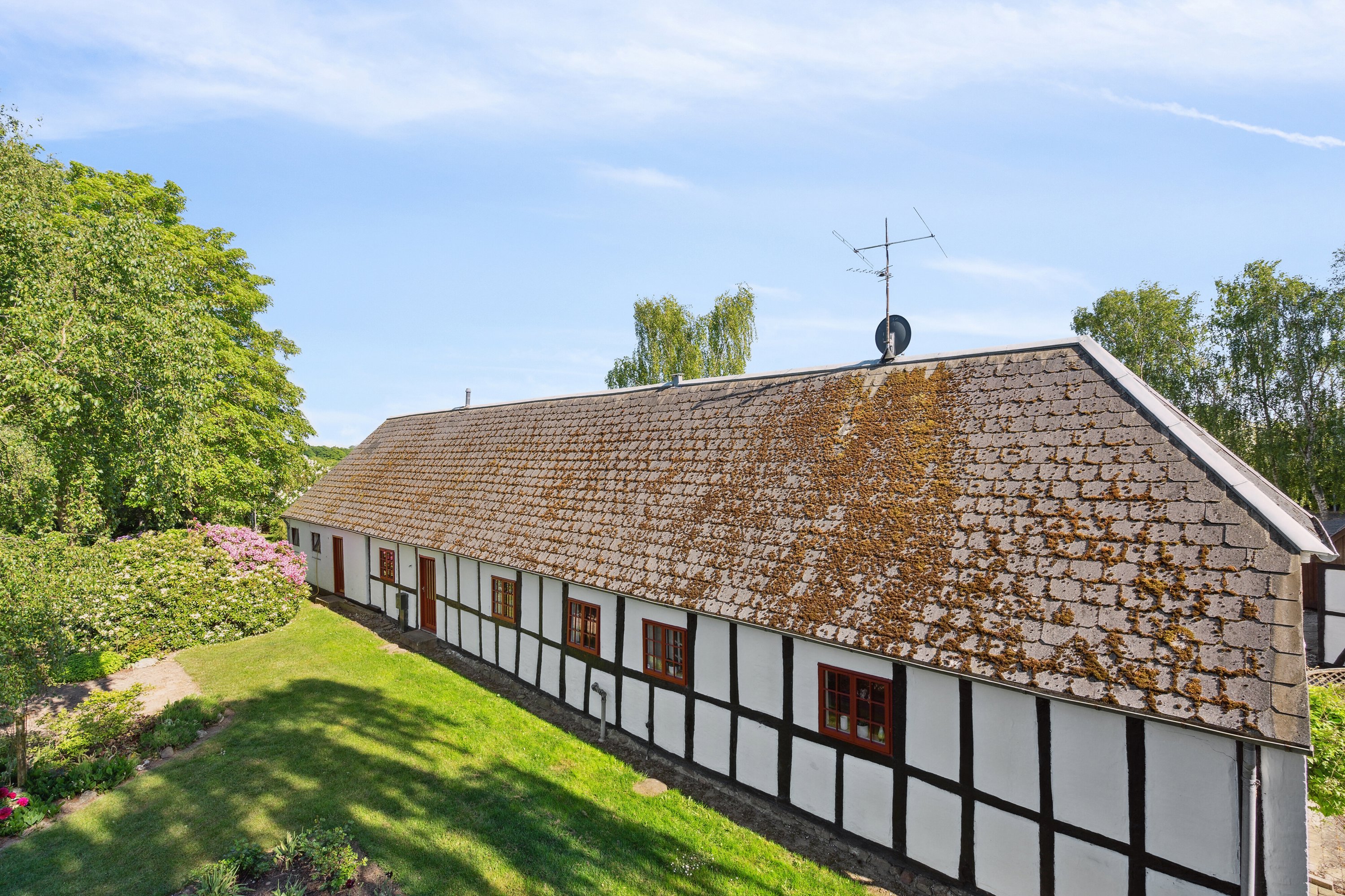 Fremhævet stuehus mod haven  billede i fuldskærmstilstand. Billede af Sølvbjergvej 2, Pejrup, 5600 Faaborg