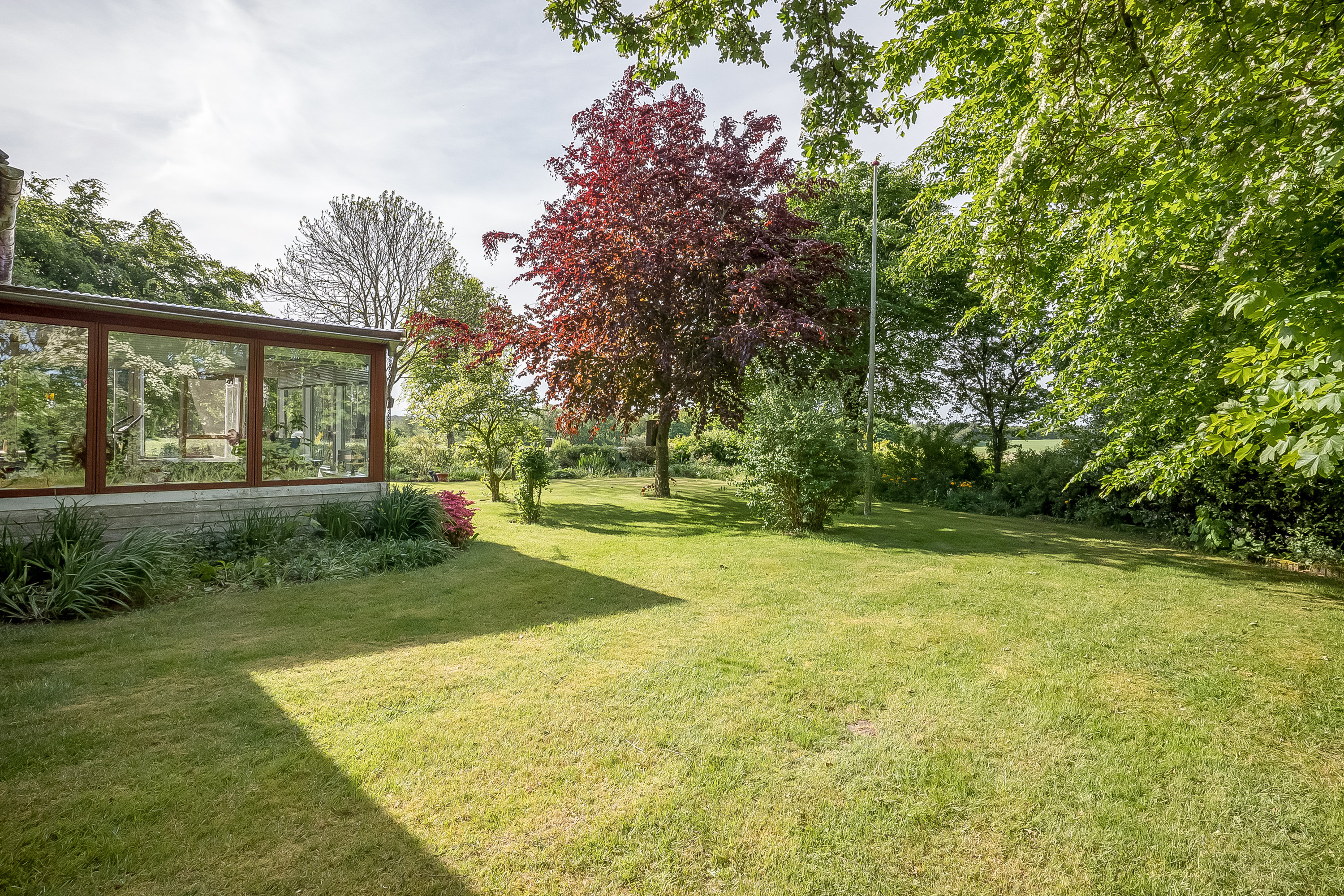 Fremhævet have billede i fuldskærmstilstand. Billede af Ormstrupvej 8, Idom, 7500 Holstebro