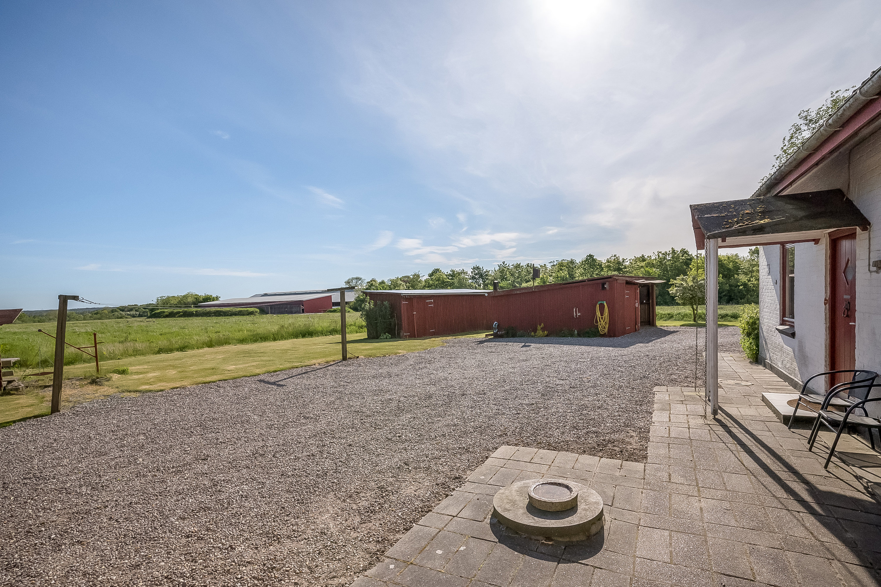 Fremhævet gårdmiljø billede i fuldskærmstilstand. Billede af Ormstrupvej 8, Idom, 7500 Holstebro