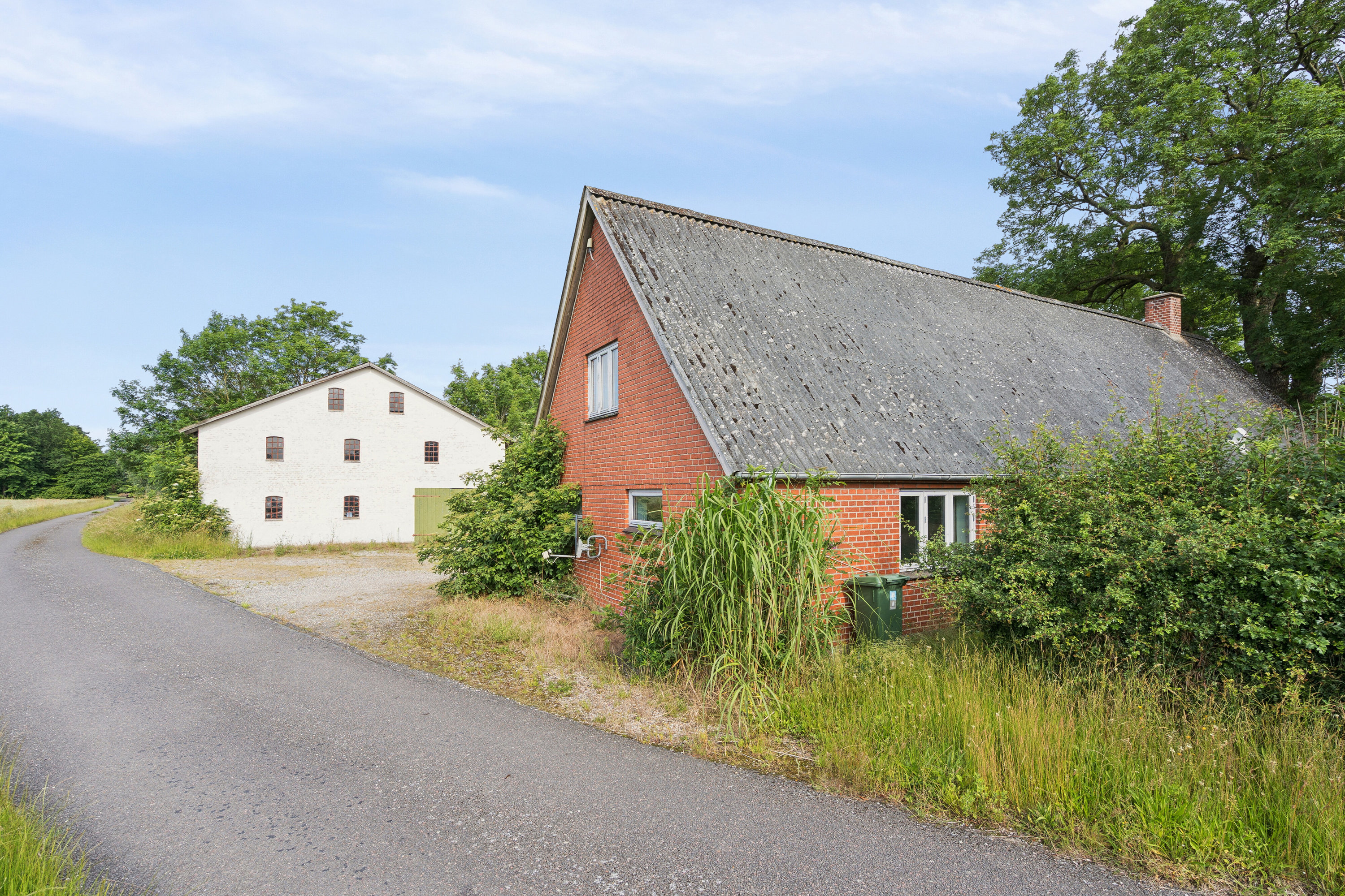Fremhævet set fra haven billede i fuldskærmstilstand. Billede af Kirstinebjergvej 27, Årslev, 5792 Årslev