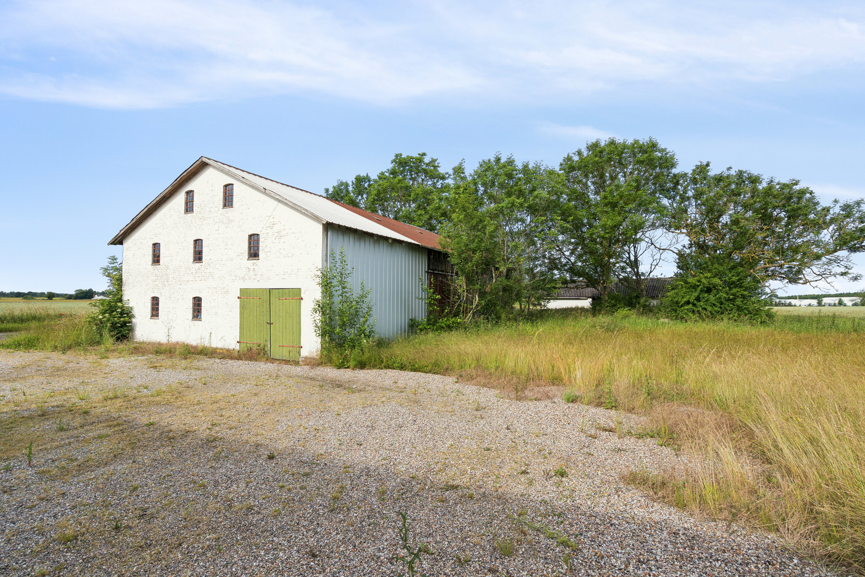 Fremhævet set fra haven billede i fuldskærmstilstand. Billede af Kirstinebjergvej 27, Årslev, 5792 Årslev