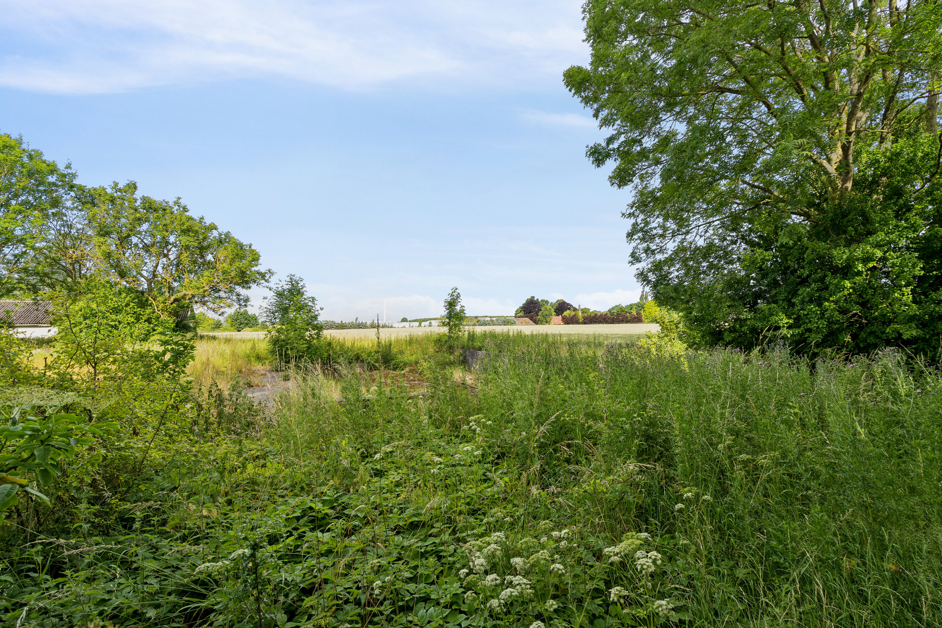 Fremhævet udendørs billede i fuldskærmstilstand. Billede af Kirstinebjergvej 27, Årslev, 5792 Årslev