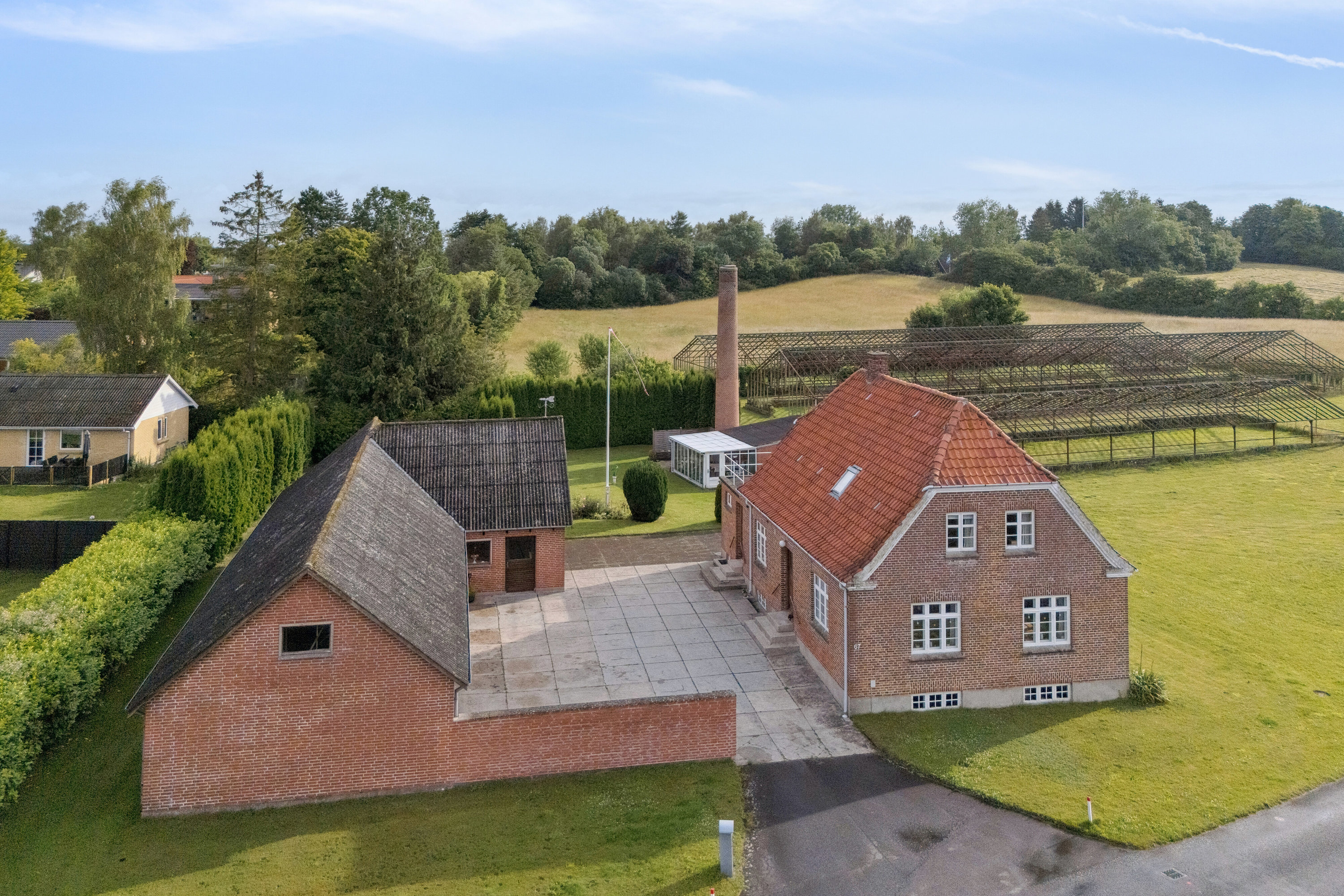 Fremhævet udendørs billede i fuldskærmstilstand. Billede af Tyrsbjergvej 67, Villestofte, 5210 Odense NV