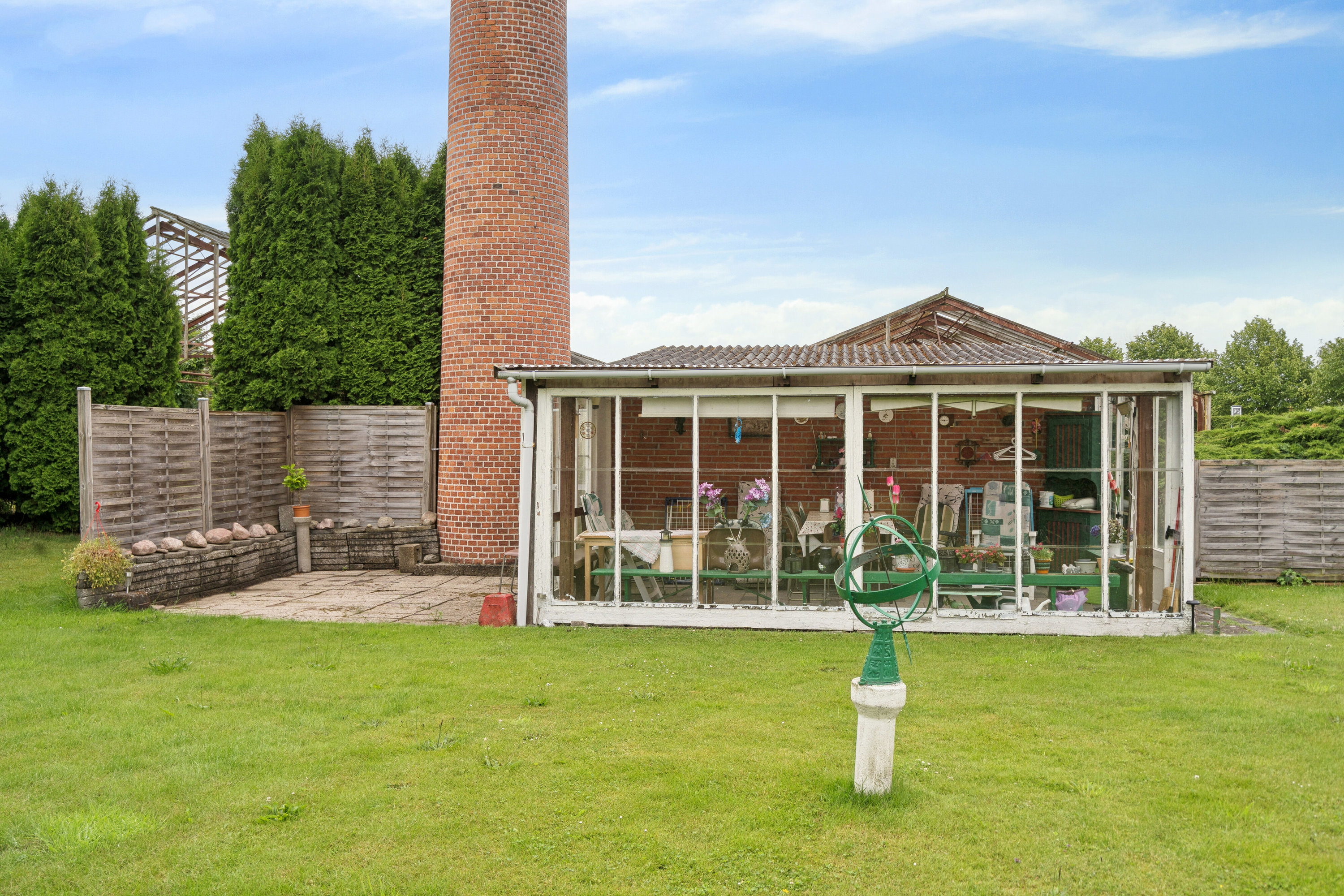 Fremhævet set fra haven billede i fuldskærmstilstand. Billede af Tyrsbjergvej 67, Villestofte, 5210 Odense NV