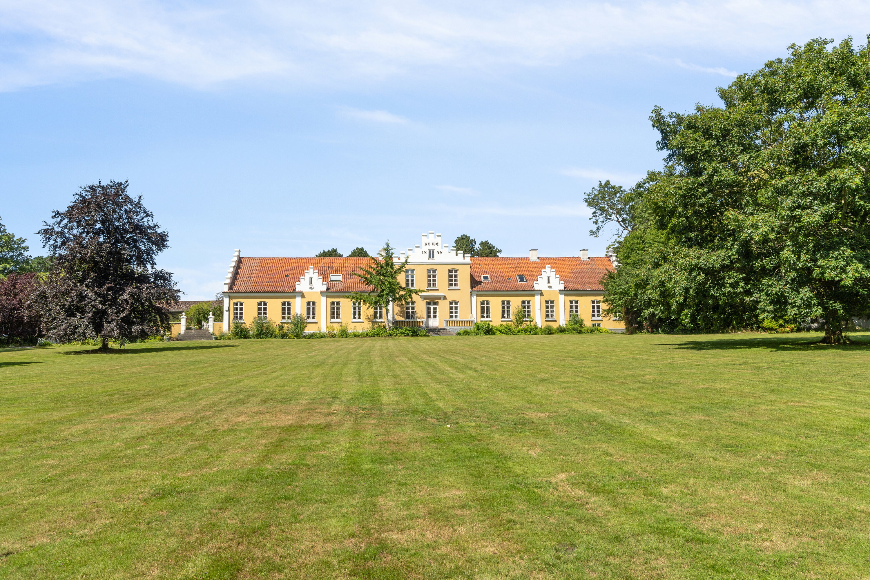 Fremhævet set fra haven billede i fuldskærmstilstand. Billede af Ladegårdsvej 101, Branderslev, 4900 Nakskov