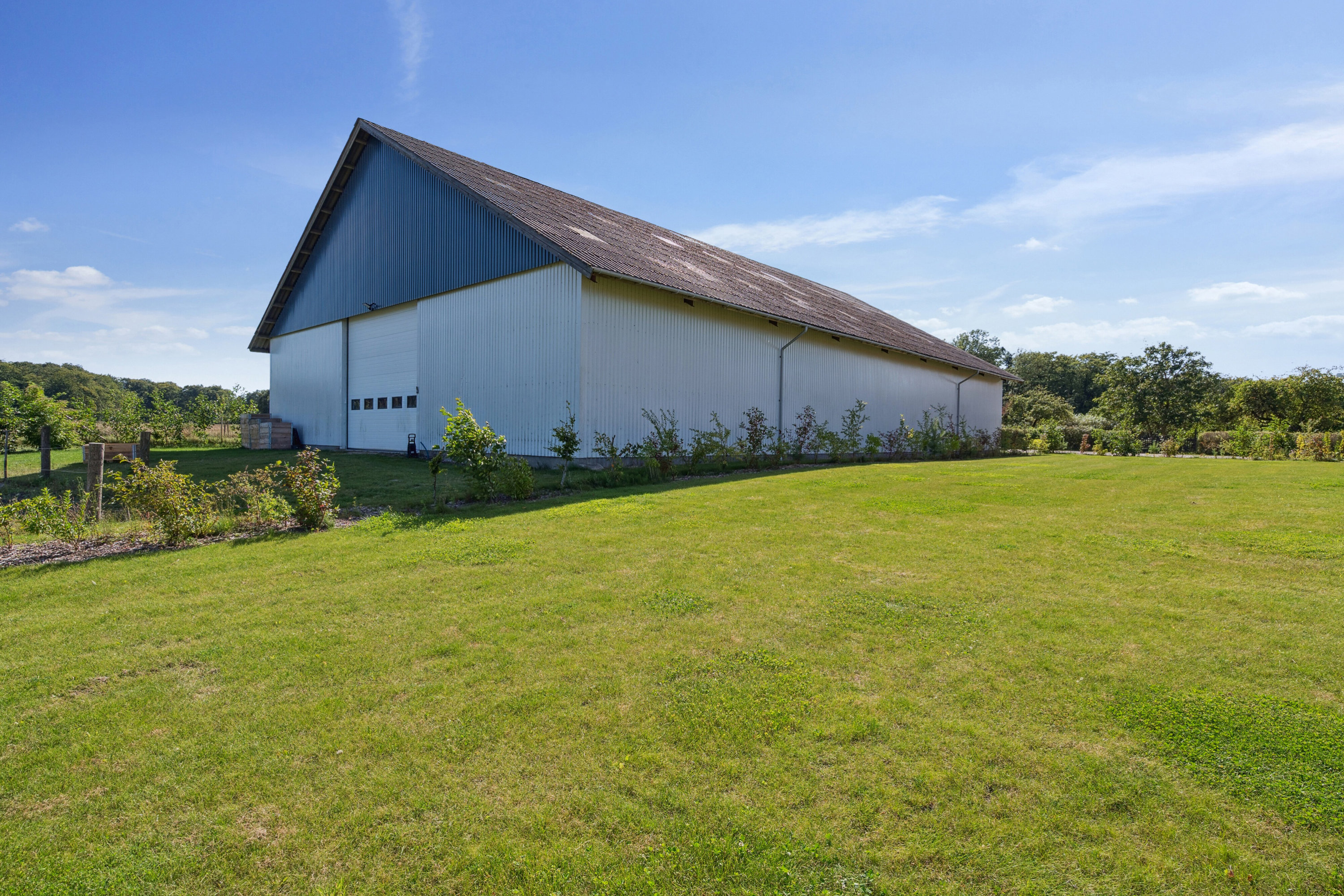 Fremhævet set fra haven billede i fuldskærmstilstand. Billede af Bøgildshøjvej 10, Fangel, 5260 Odense S