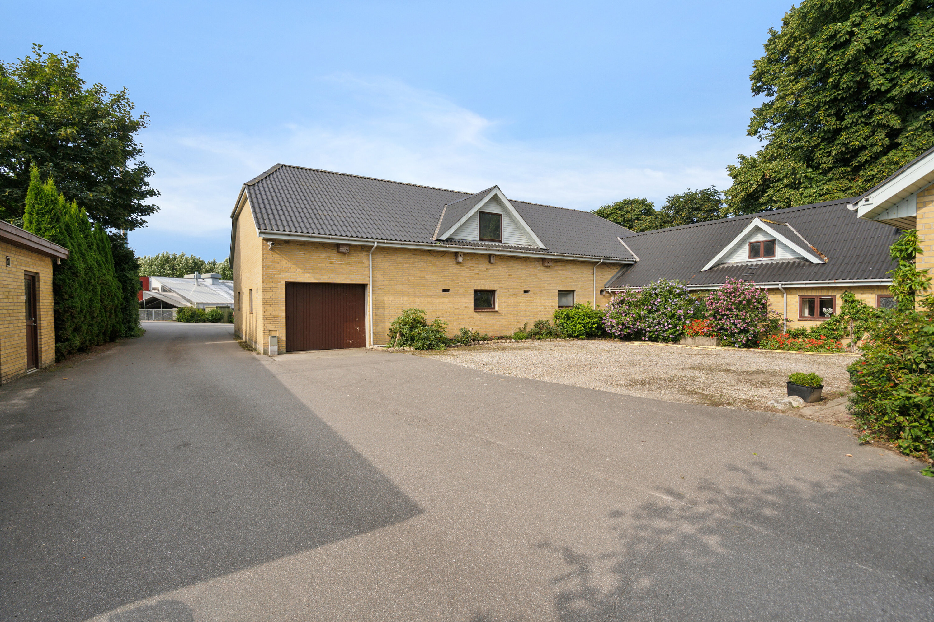 Fremhævet gårdsplads n38 billede i fuldskærmstilstand. Billede af Neversvej 40, 5690 Tommerup