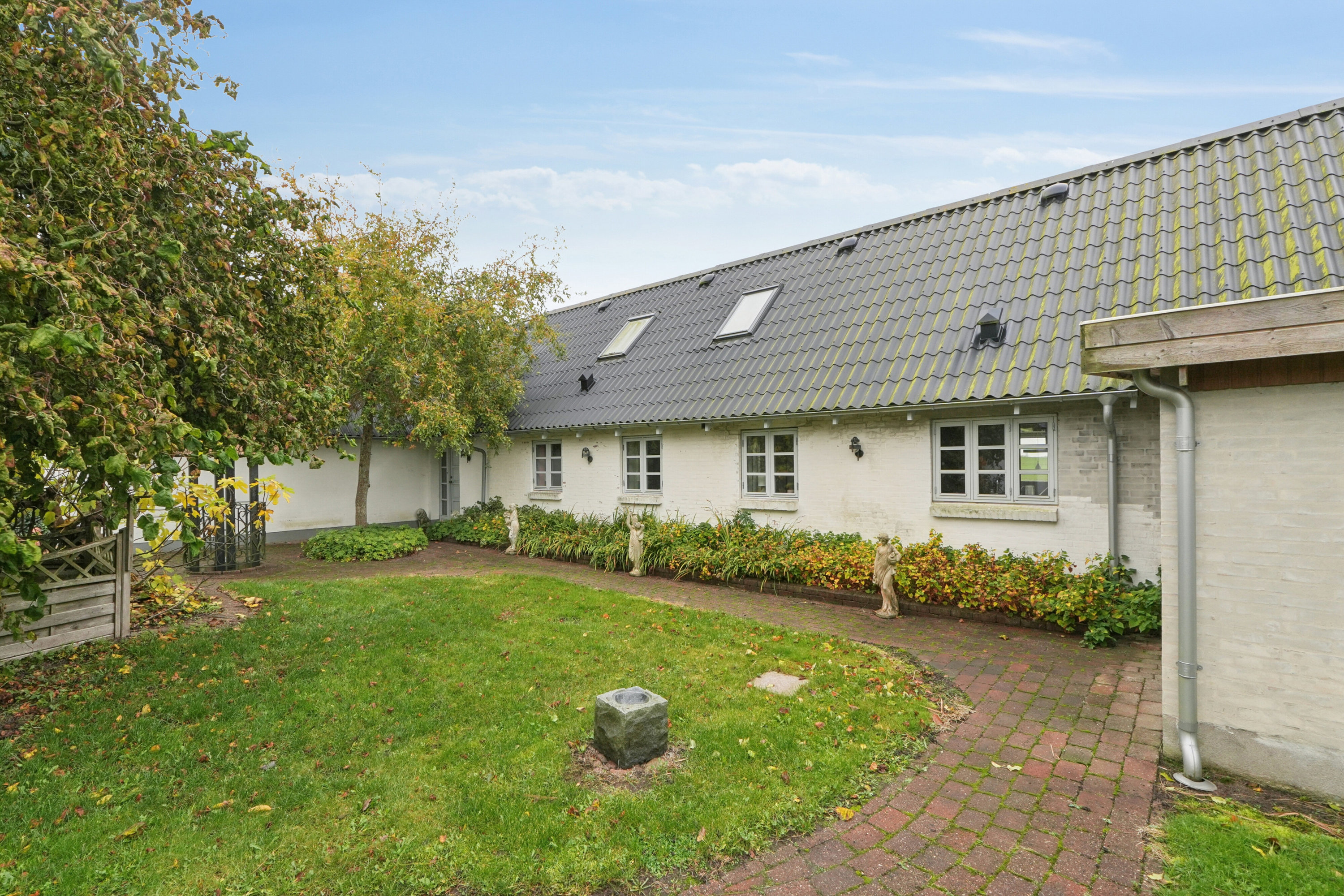 Fremhævet set fra haven billede i fuldskærmstilstand. Billede af Hovedvejen 18, Rynkeby, 5750 Ringe