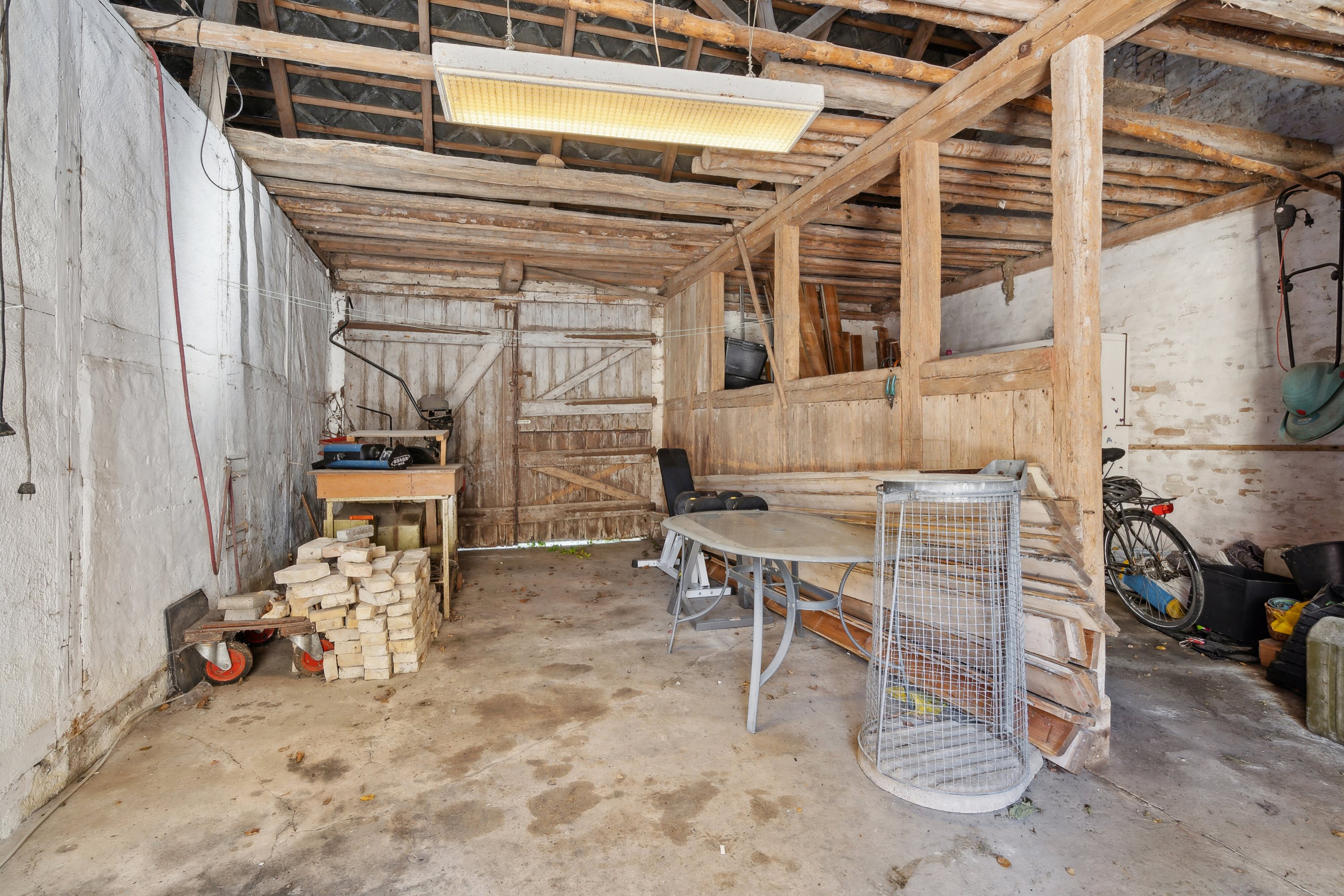 Fremhævet vognport billede i fuldskærmstilstand. Billede af Middelfartvej 635, Spedsbjerg, 5491 Blommenslyst