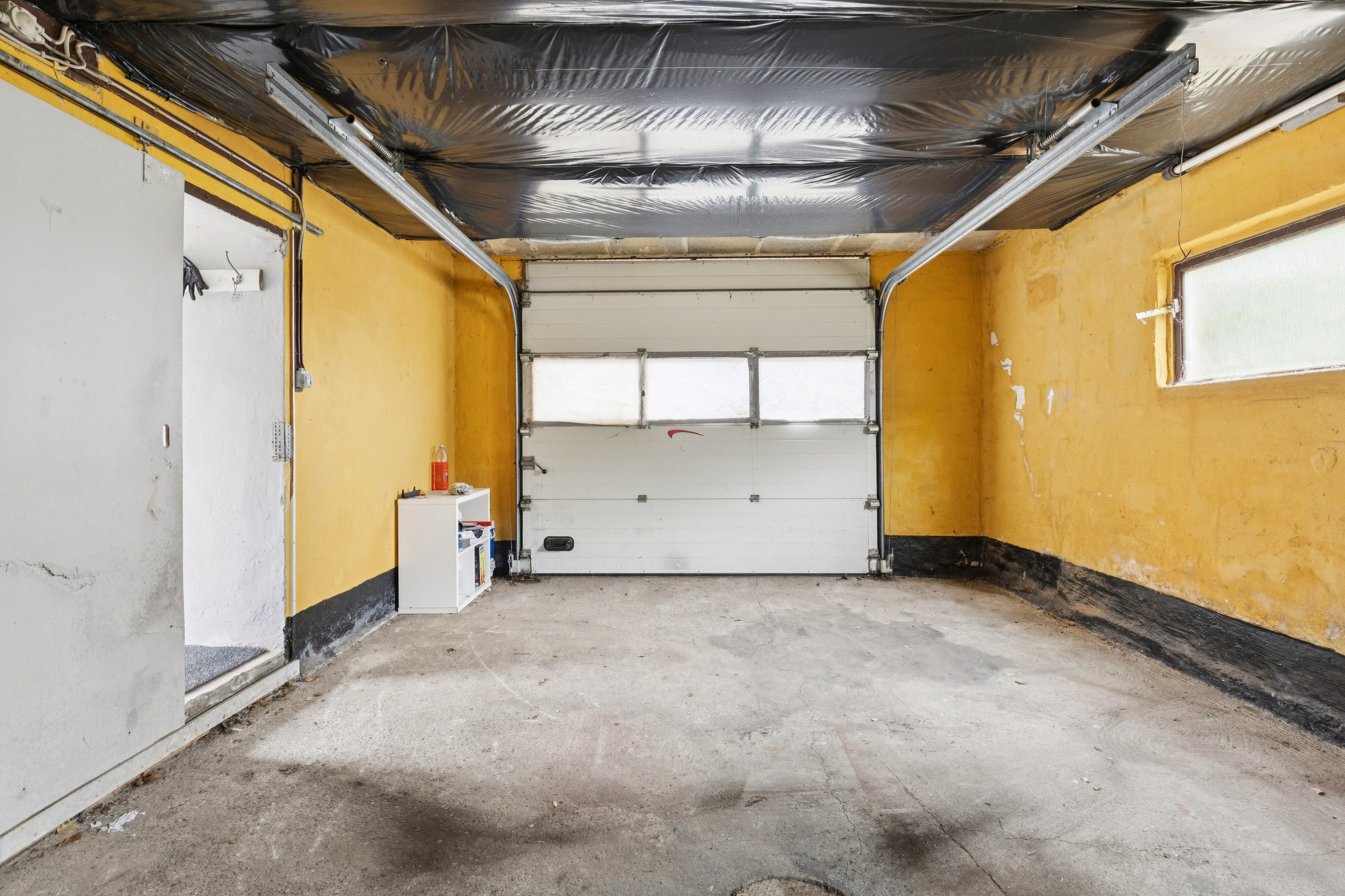 Fremhævet garage med port billede i fuldskærmstilstand. Billede af Assensvej 168, 5600 Faaborg