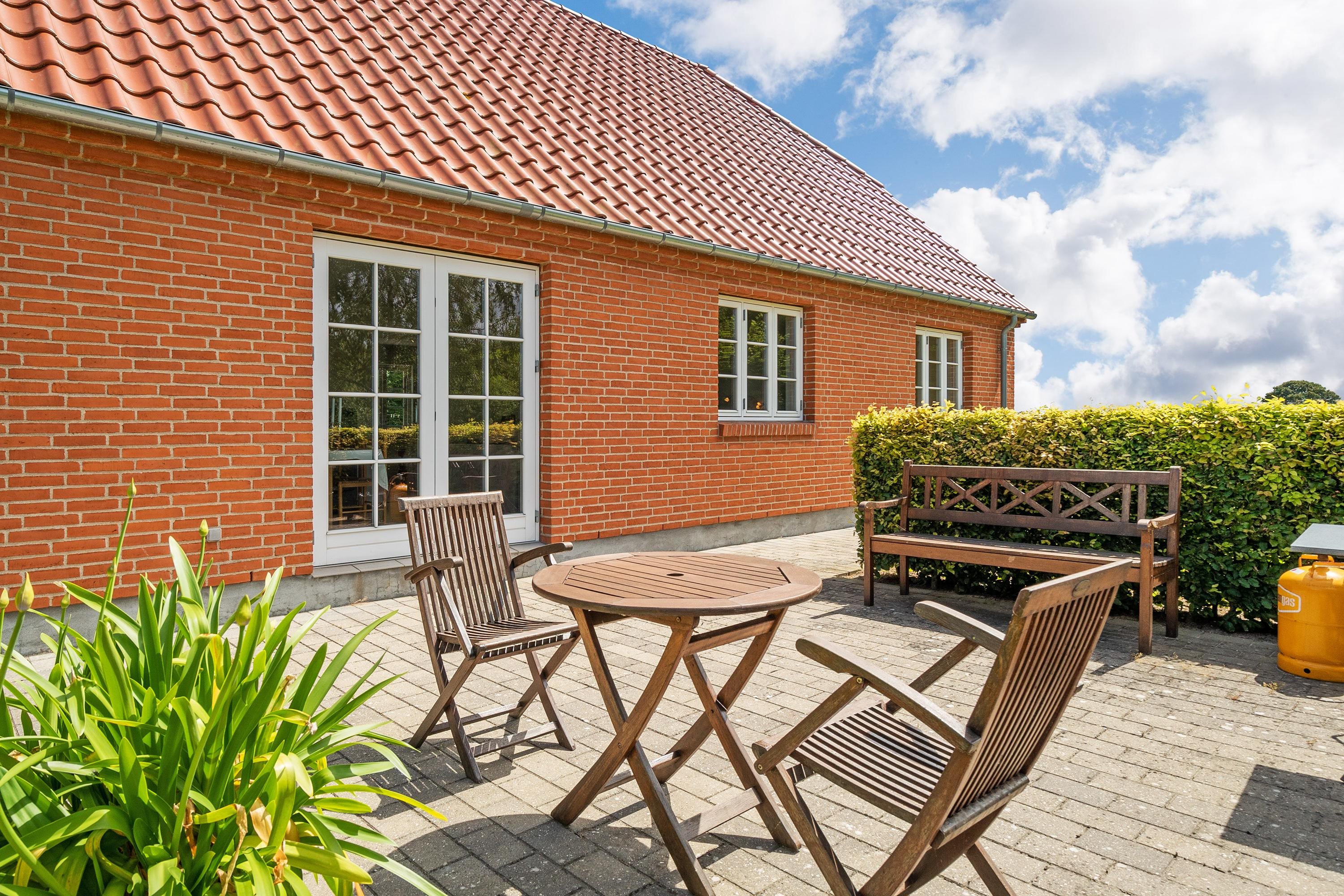 Fremhævet terrasse billede i fuldskærmstilstand. Billede af Nykøbingvej 159, Horreby, 4800 Nykøbing F