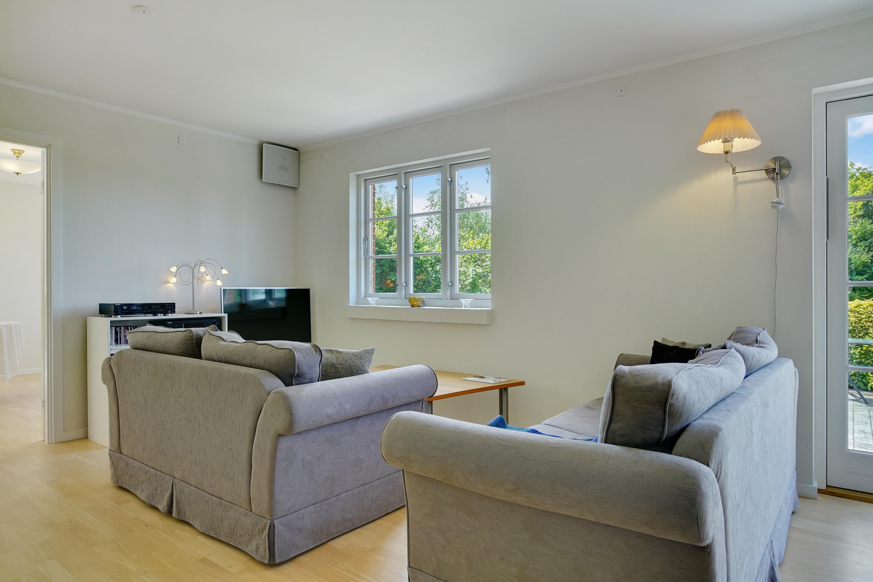 Fremhævet stue billede i fuldskærmstilstand. Billede af Nykøbingvej 159, Horreby, 4800 Nykøbing F